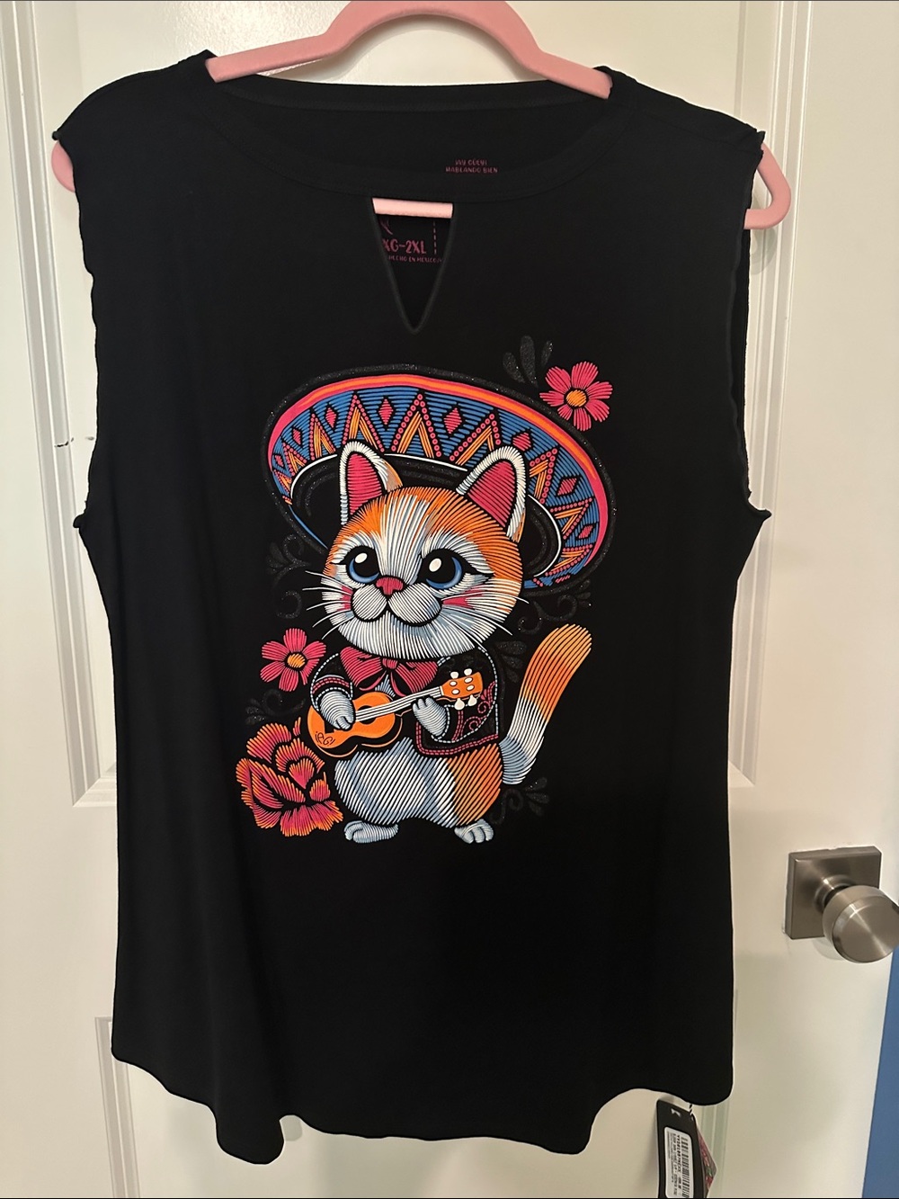 Black Sleeveless Graphic Tee with Festive Cat Motif